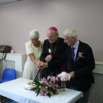 Golden Wedding couple with Archbishop George Stack